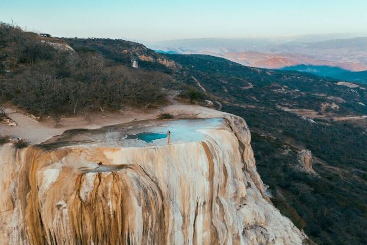 a canyon with a mountain in the background